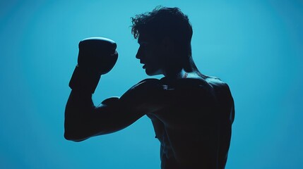 Aufkleber - Silhouette of a man holding a boxing glove. Suitable for sports and fitness concepts
