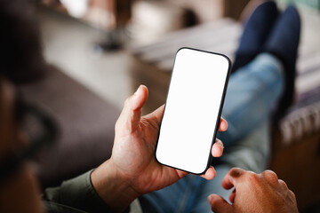 cell phone blank white screen mockup.hand holding texting using mobile on desk at office.background empty space for advertise.work people contact marketing business,technology