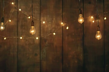 Wall Mural - Antique Edison style light bulbs on dark background