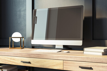 Poster - A modern computer monitor on a wooden desk, with minimalist decor and a dark background, embodying a clean and professional workspace. 3D Rendering