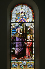 Saint Joseph with child Jesus, stained glass window in the Church of St. Maurus the Abbot in Bosiljevo, Croatia