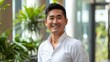 © Bijac - confident and handsome asian man smiling at camera portrait photography