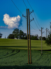 Poster - Strommasten und große Wolkengebilde