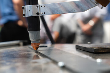 Aufkleber - Automatic welding robot in a modern factory in operation.