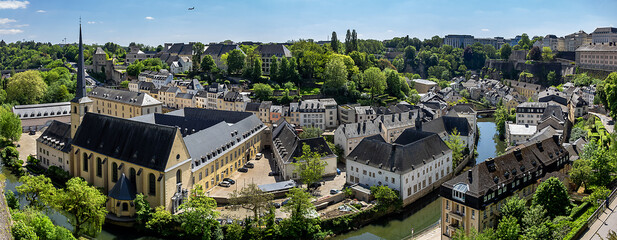 Wall Mural - Saint John’s Church or Saint John on the Stone (Eglise Saint-Jean, 1705) in the valley and the river Alzette. Church St Jean of Grund belonged to the Benedictine Abbey of Munster. Luxembourg City.