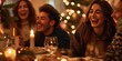 © gunzexx png and bg - Friends laughing and sharing a meal at a festive table with Christmas lights in the background