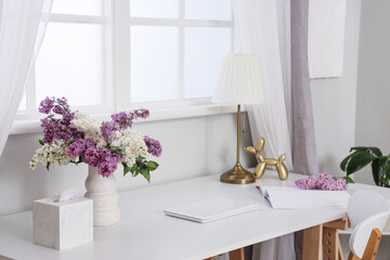 Wall Mural - Vase with lilac flowers on table in light room