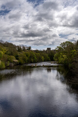 Wall Mural - View of Barnard Castle from the river Tees on a cloudy spring day, County Durham, England