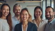 © JINGWEN - Professional white-collar team smiling confidently in a modern office setting, faces sharply in focus under bright lights, HD close-up of their upper bodies