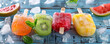 ©  J. GALIÑANES STOCK - Summer banner with fruit popsicles on a light blue wooden background. Banner, web, vlog, or advertisement.
