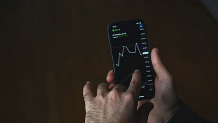 Aufkleber - Crypto currency trading chart mobile phone. Media. Close-up of man looking at currency chart on his phone. Cryptocurrency chart on stock exchange from your phone