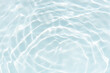 © Water 💧 Shining 📸 - Blue water with ripples on the surface. Defocus blurred transparent blue colored clear calm water surface texture with splashes and bubbles. Water waves with shining pattern texture background.