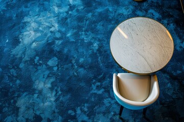 Wall Mural - Blue carpeted interior cafe table with top view armchair