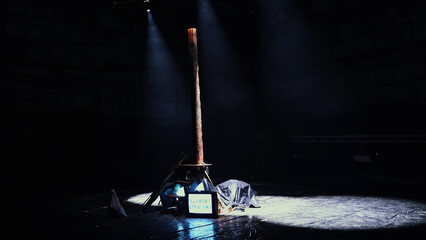 Poster - Dark empty stage with wooden pillar and tv monitor. Media. Preparation for the performance.
