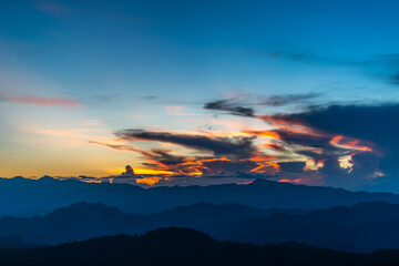 Wall Mural - Sky gradient from blue to orange sunset