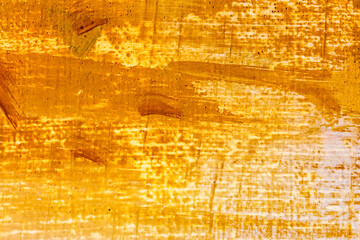 Wall Mural - vibrant yellow canvas background with orange brush strokes.