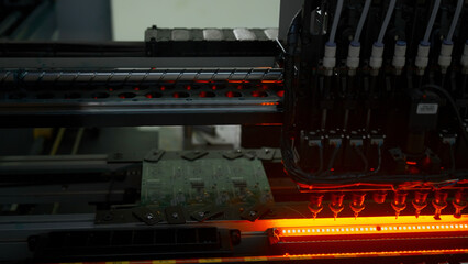 Poster - Fully automated assembly line at electronics factory. Creative. Component Installation on circuit board.