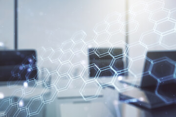 Poster - Creative concept of wireless technology with hexagon hologram and modern desktop with computer on background. Big data and database concept. Multiexposure