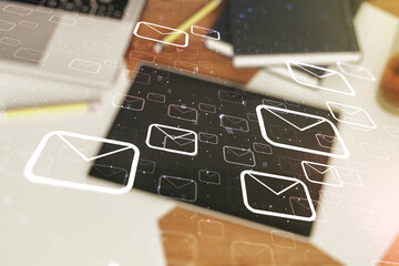 Poster - Double exposure of postal envelopes hologram and modern digital tablet on background, top view. Electronic mail and spam concept