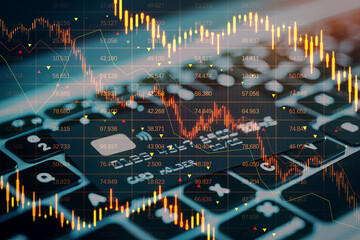 Poster - Close up of bank cards on laptop keyboard with downward red forex candlestick hologram on blurry background. Financial crisis, stock and recession concept. Double exposure.