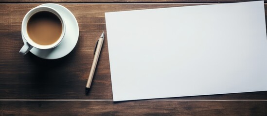 Aufkleber - Office workplace table with blank paper page coffee cup supplies and laptop Flat lay Top view with space for your goals. copy space available