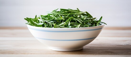 Poster - Bowl of dry tarragon on white wooden table Space for text. copy space available