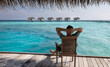 © Song_about_summer - summer holidays, beach vacation in Maldives, man tourist relaxing and enjoying life near turquoise water