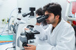 © Westend61 - Scientist analyzing sample with microscope in laboratory