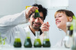 © Westend61 - Smiling scientists analyzing samples of spirulina algae in flask at laboratory