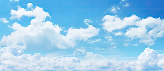 Canvas Print - Blue sky with clouds in a scenic copy space image