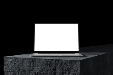 Poster - Laptop with a blank screen on a stone table, dark background. A modern scene perfect for placing your own content on the screen. Minimalist, professional look.