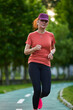 © Xalanx - Athletic mature woman running in the park