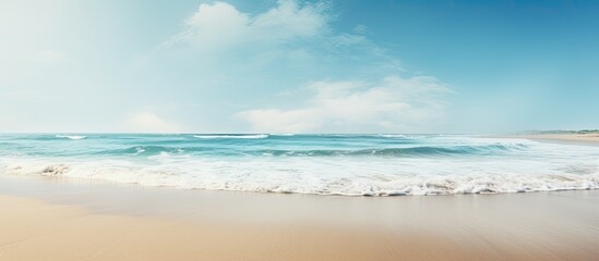 Wall Mural - Beautiful ocean beach with sand copy space image