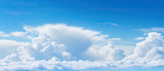 Poster - A serene cloud in shades of blue and white drifts gracefully across a clear sky ideal for a copy space image