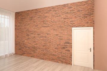 Poster - Empty room with brick wall, white door and laminated floor