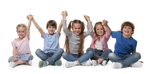 Poster - Group of cute children holding hands on white background