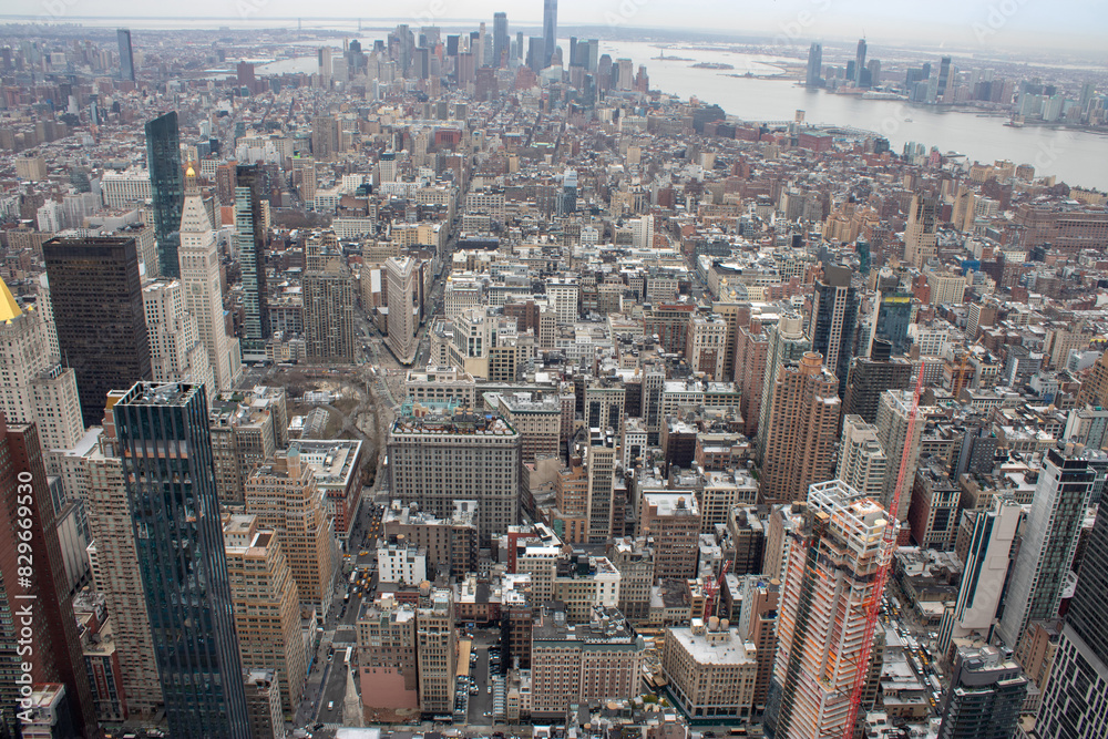 Aerial view of Manhattan in New York City showing the classic high rise ...