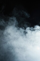Poster - Close up shot of smoke on a black background, perfect for design projects