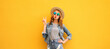 © rohappy - Portrait beautiful stylish young woman blowing kiss in summer hat posing on yellow studio background
