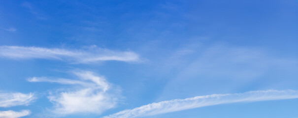 Wall Mural - Blue sky background with tiny clouds. Cloudscape - Blue sky and white clouds. Clouds with blue sky