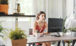 © StockPhotoPro - Young woman working with her computer
