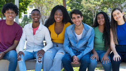 Youth of South America - Laughing latin american and hispanic and african american and caucasian young adults