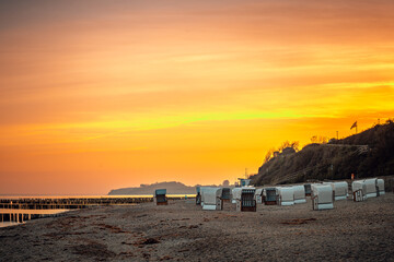 Wall Mural - Scenic view of a beautiful sunset over the beach