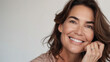 © LotusBlanc - Portrait of a Smiling Mature Brunette with Copy Space, Woman in Her 40s or 50s, Beauty and Confidence in Middle Age, Skincare, Lifestyle and Natural Cosmetics  Concept.