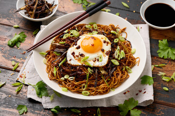 Wall Mural - Scallion Oil Noodles with fried egg on top and chilli oil