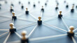 © nextzimost - Network of connected pawns with strings on a blue surface. Blurred background. Connectivity and teamwork concept. Design for poster, banner, wallpaper. Close-up photography.