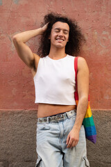 Poster - Portrait of gay man with sensual pose smiling at camera with vintage background