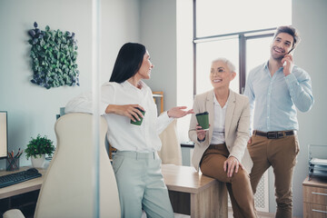 Sticker - Photo of business people women talking with takeaway cup in workplace workstation