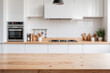 © organik - Wooden table on blurred kitchen bench background. Empty wooden table and blurred kitchen background