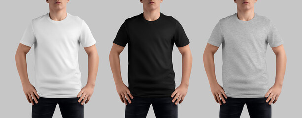 Wall Mural - Mockup of a white, black, heather t-shirt on a teenager in dark jeans, with hands on his waist, front view. Set